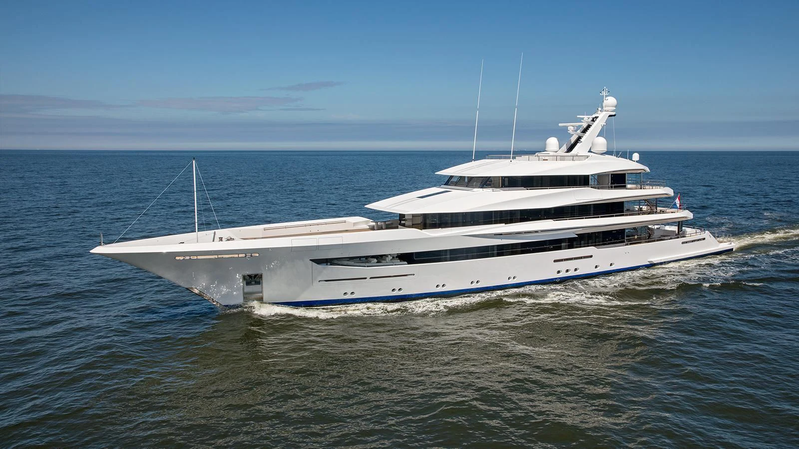 a white yacht in the water aboard JOY Yacht for Sale