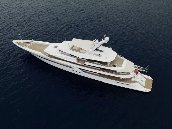 a white boat in the water aboard JOY Yacht for Sale