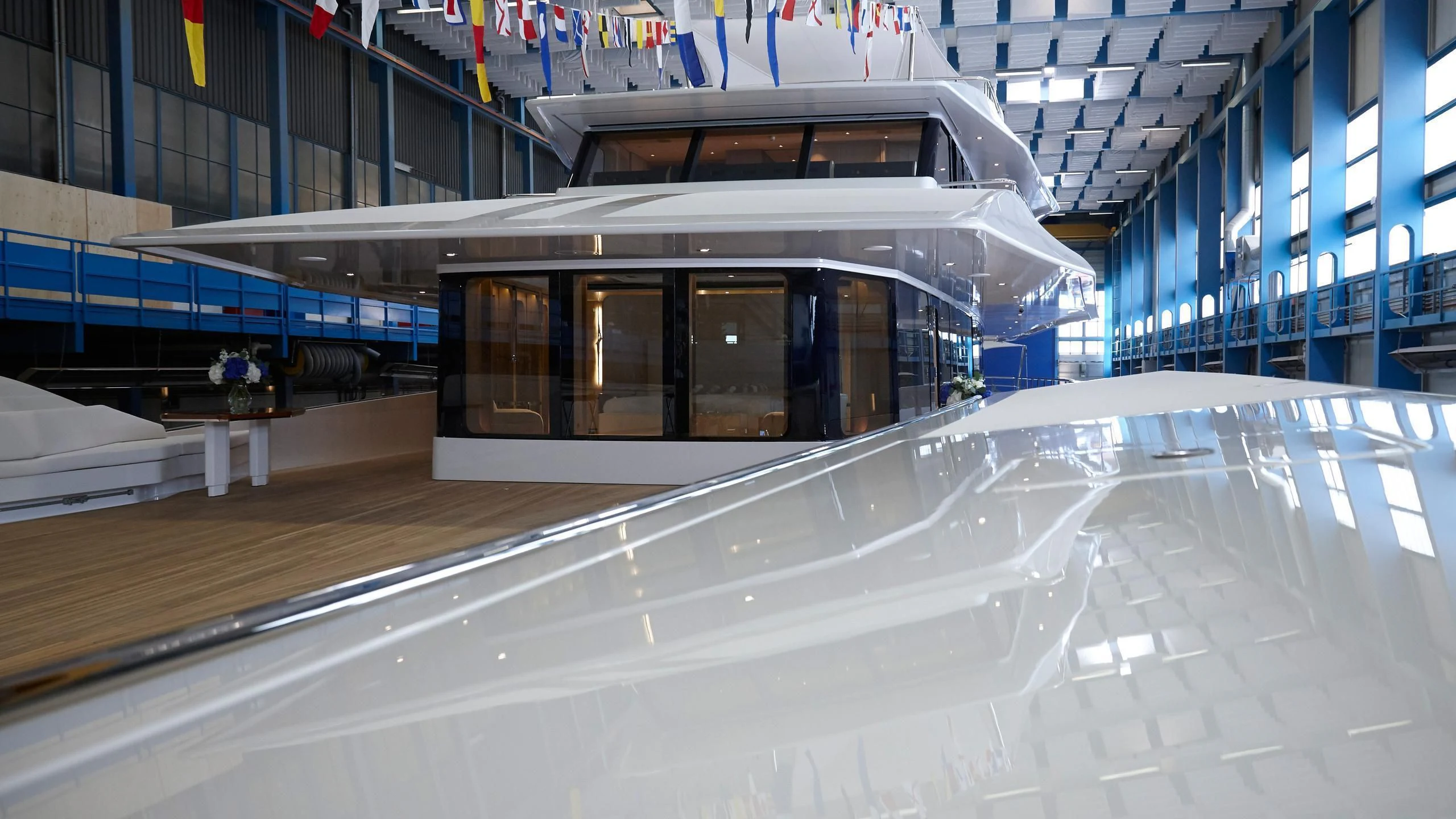 a large building with a large stage aboard JOY Yacht for Sale