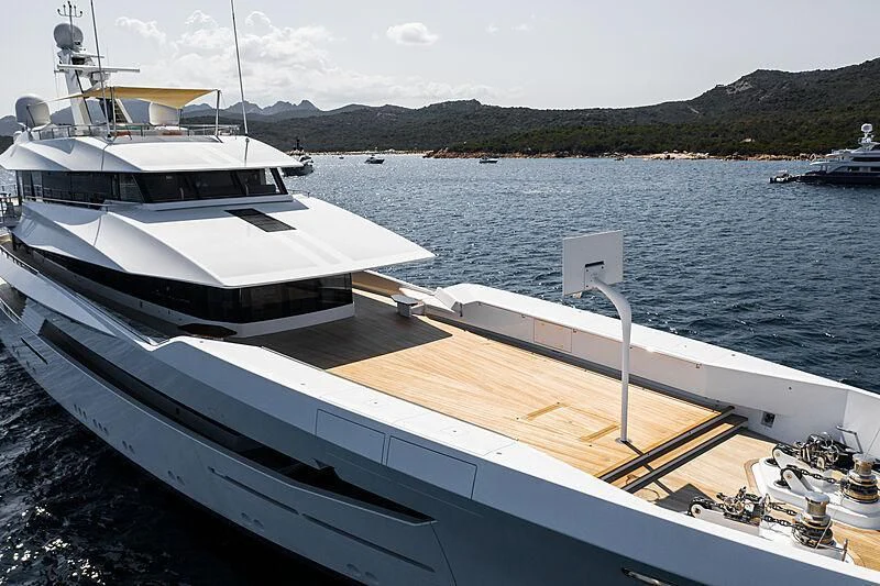 a boat docked at a pier aboard JOY Yacht for Sale