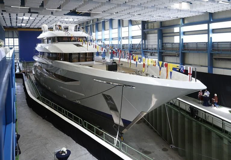 a large ship in a building aboard JOY Yacht for Sale