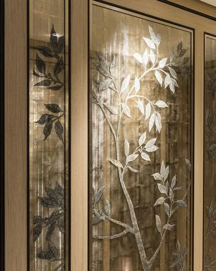 a wood door with a glass door aboard JOY Yacht for Sale