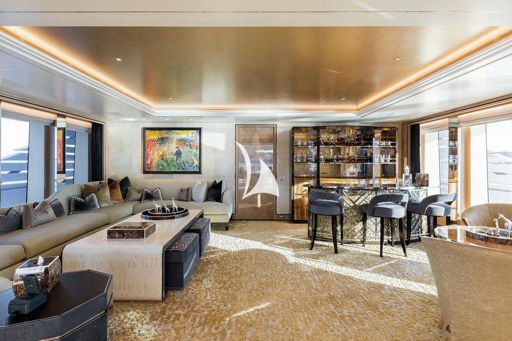 a living room with a large window aboard JOY Yacht for Sale