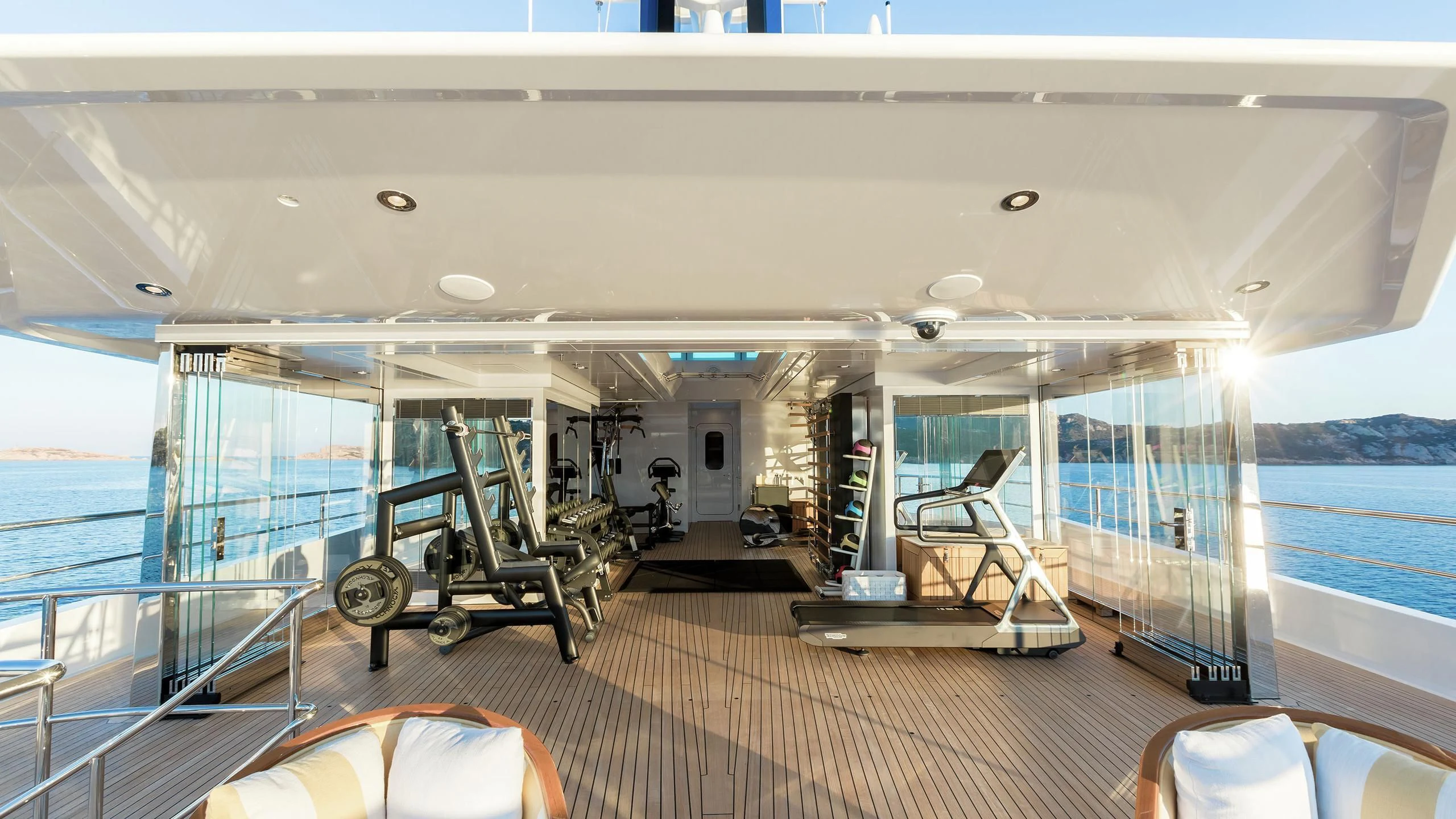a room with a large pool aboard JOY Yacht for Sale
