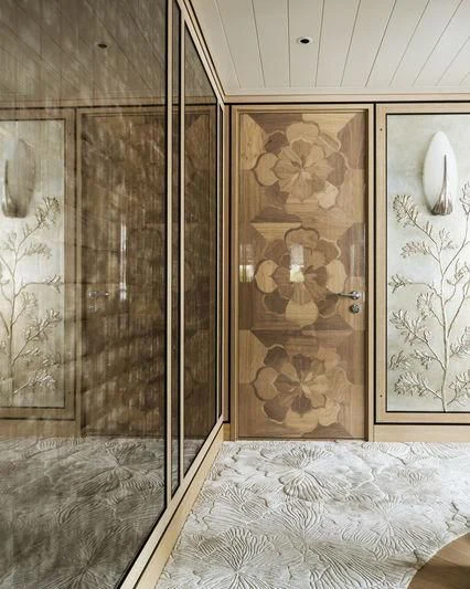 a room with a bed and a mirror aboard JOY Yacht for Sale