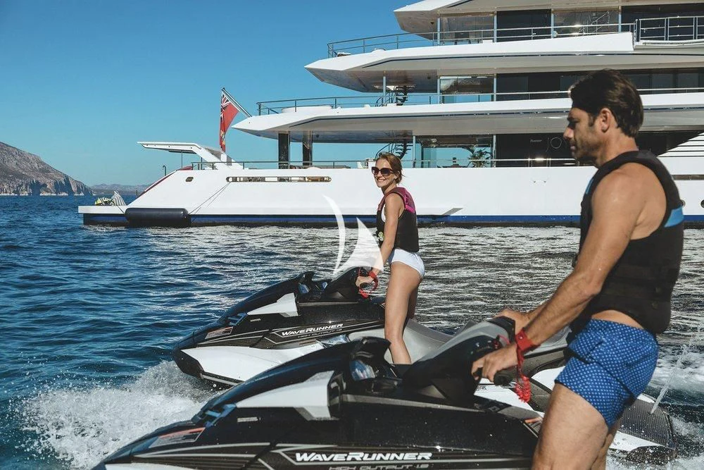 a man and woman on a boat aboard JOY Yacht for Sale