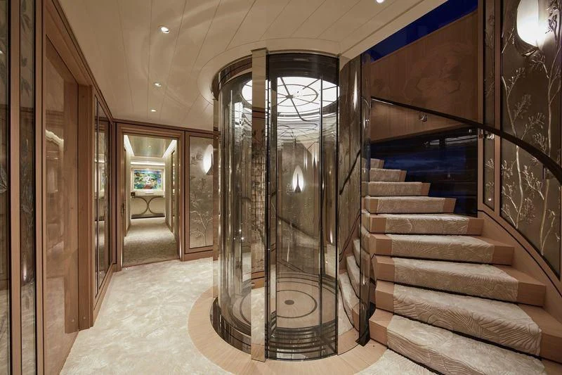 a large glass door in a room aboard JOY Yacht for Sale
