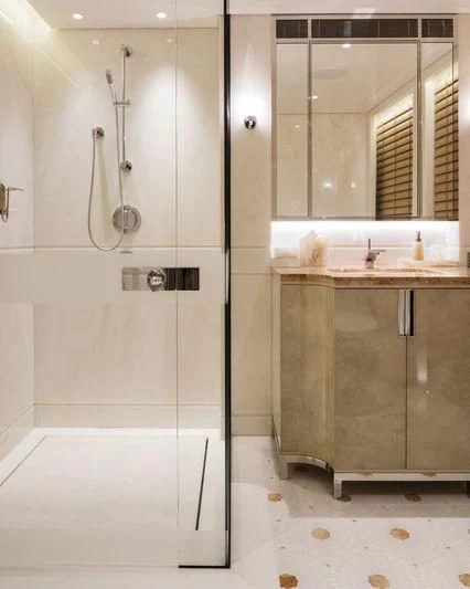 a bathroom with a sink and a mirror aboard JOY Yacht for Sale