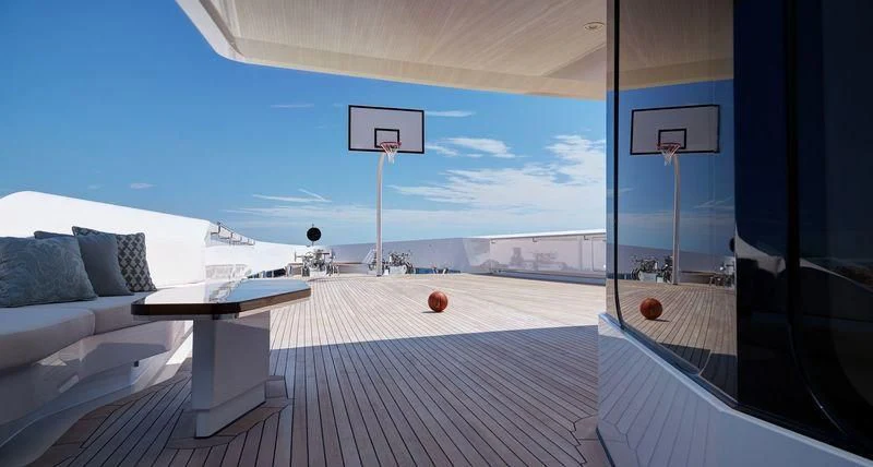 a room with a couch and a table and a window aboard JOY Yacht for Sale