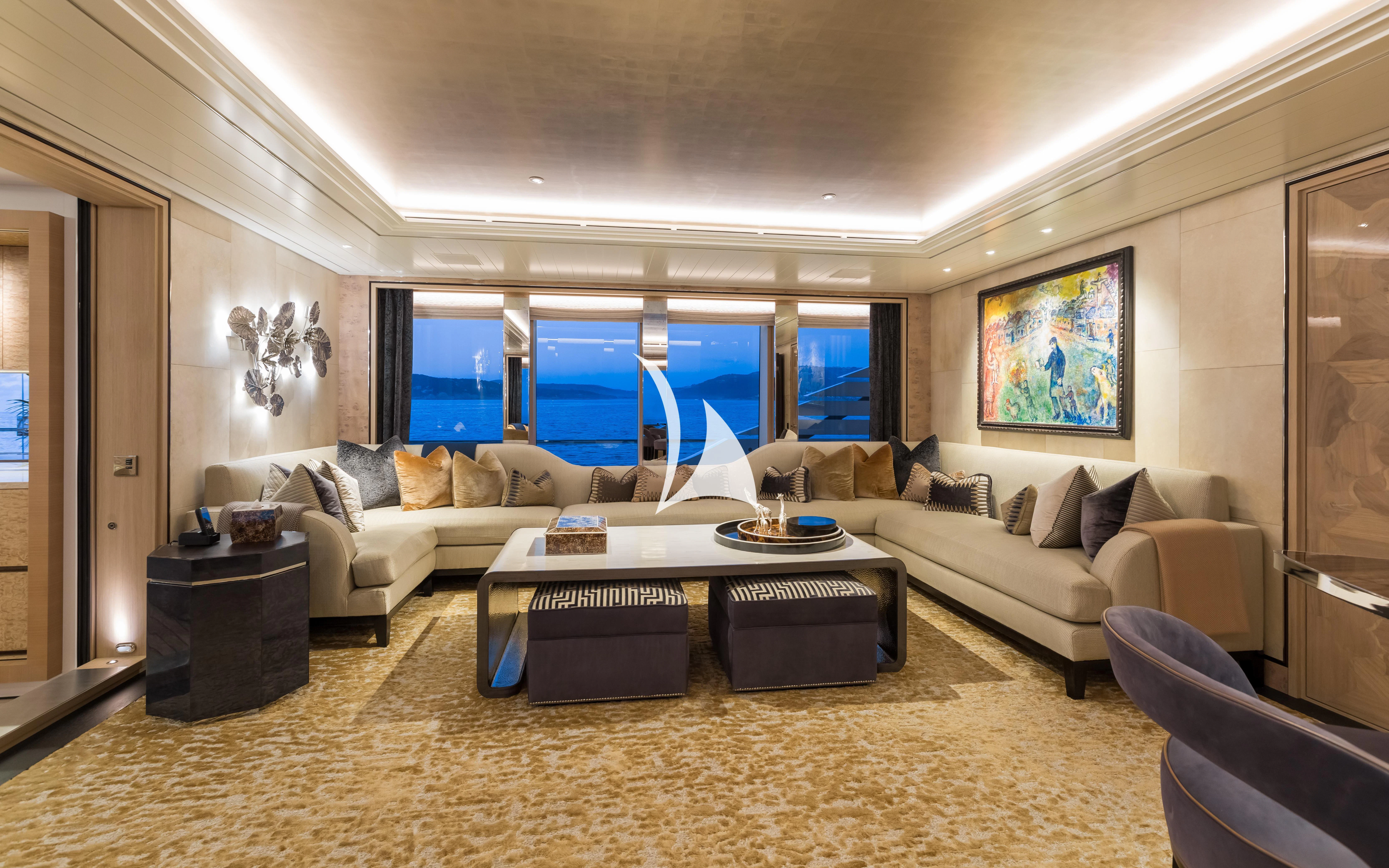 a living room with a large window aboard JOY Yacht for Sale
