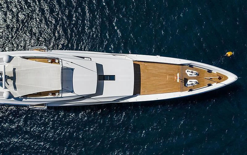 a white boat on water aboard JOY Yacht for Sale