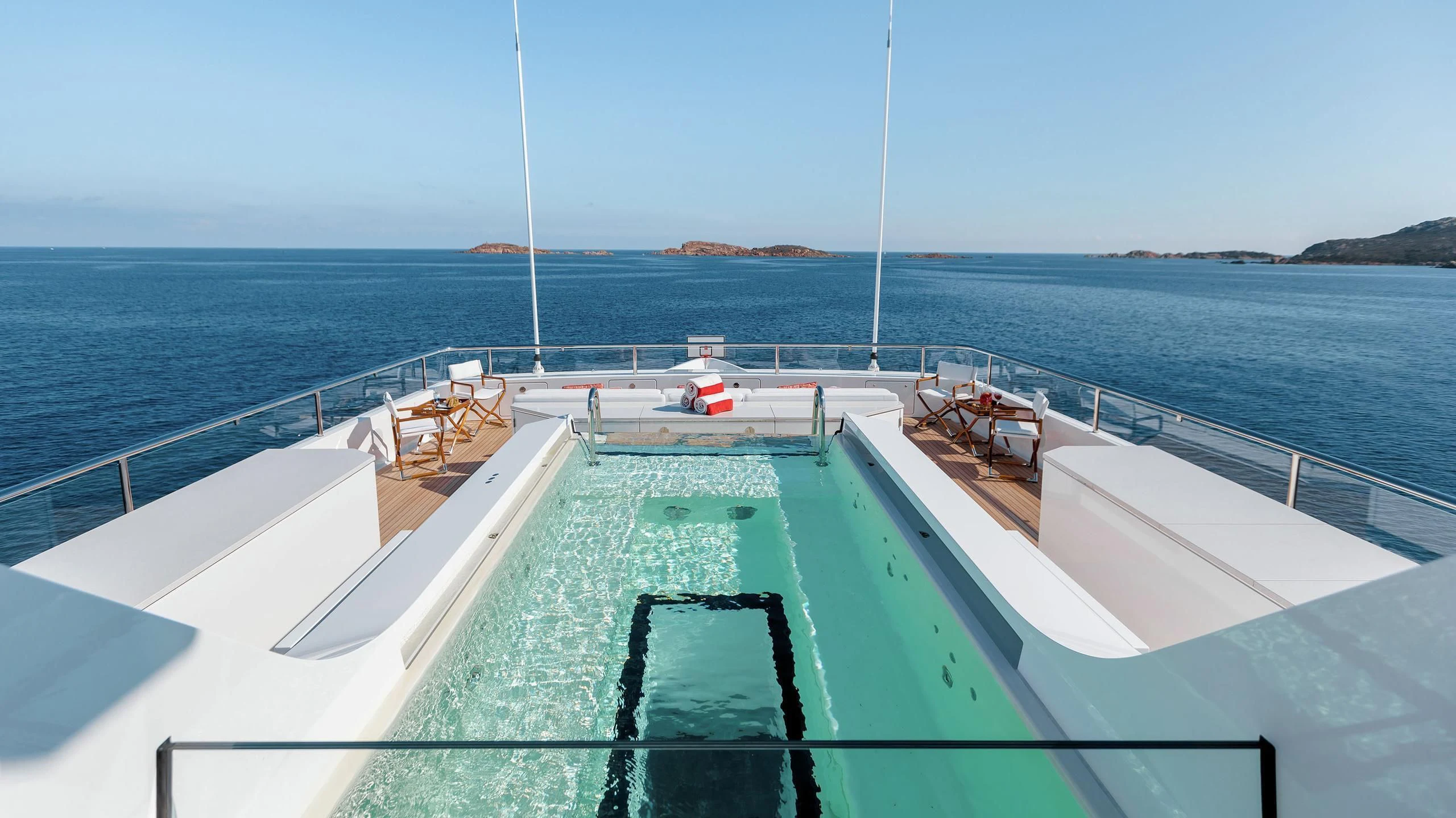 a large pool of water aboard JOY Yacht for Sale