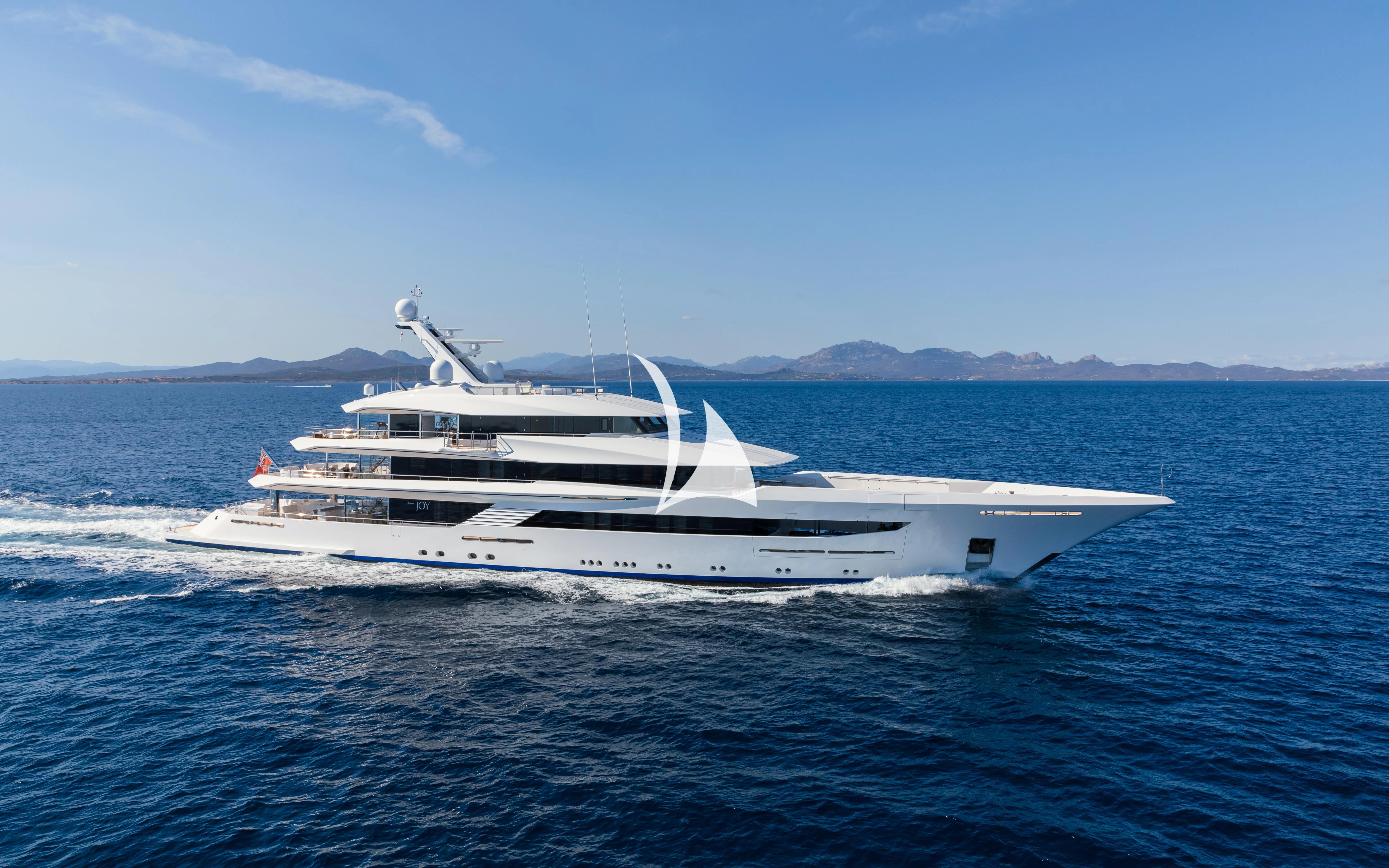 a white yacht on the water aboard JOY Yacht for Sale