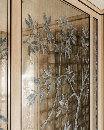 a wood surface with a drawing of a plant on it aboard JOY Yacht for Sale