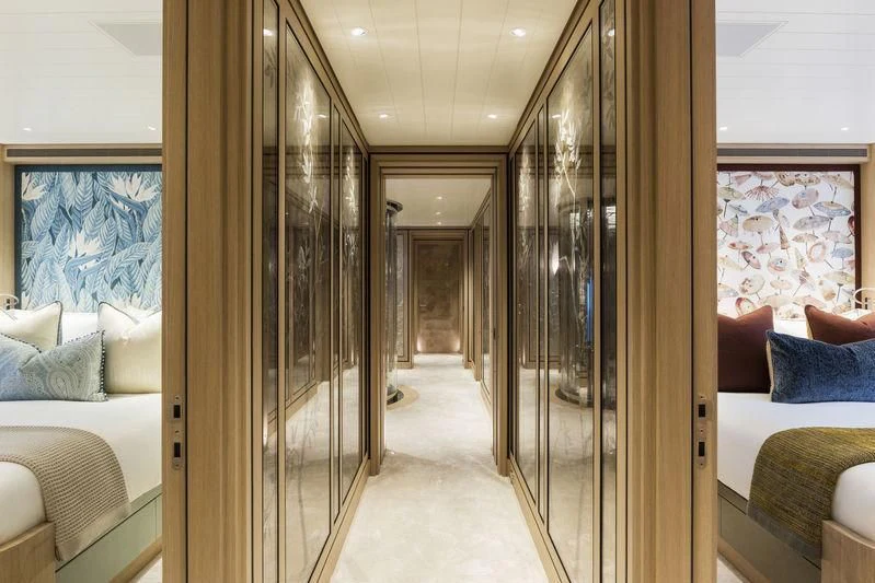 a room with a glass wall aboard JOY Yacht for Sale
