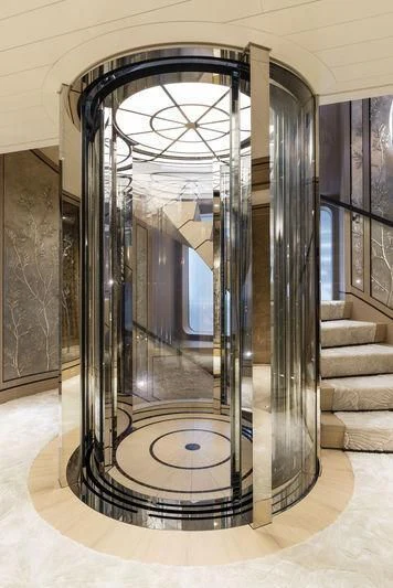 a large glass door aboard JOY Yacht for Sale