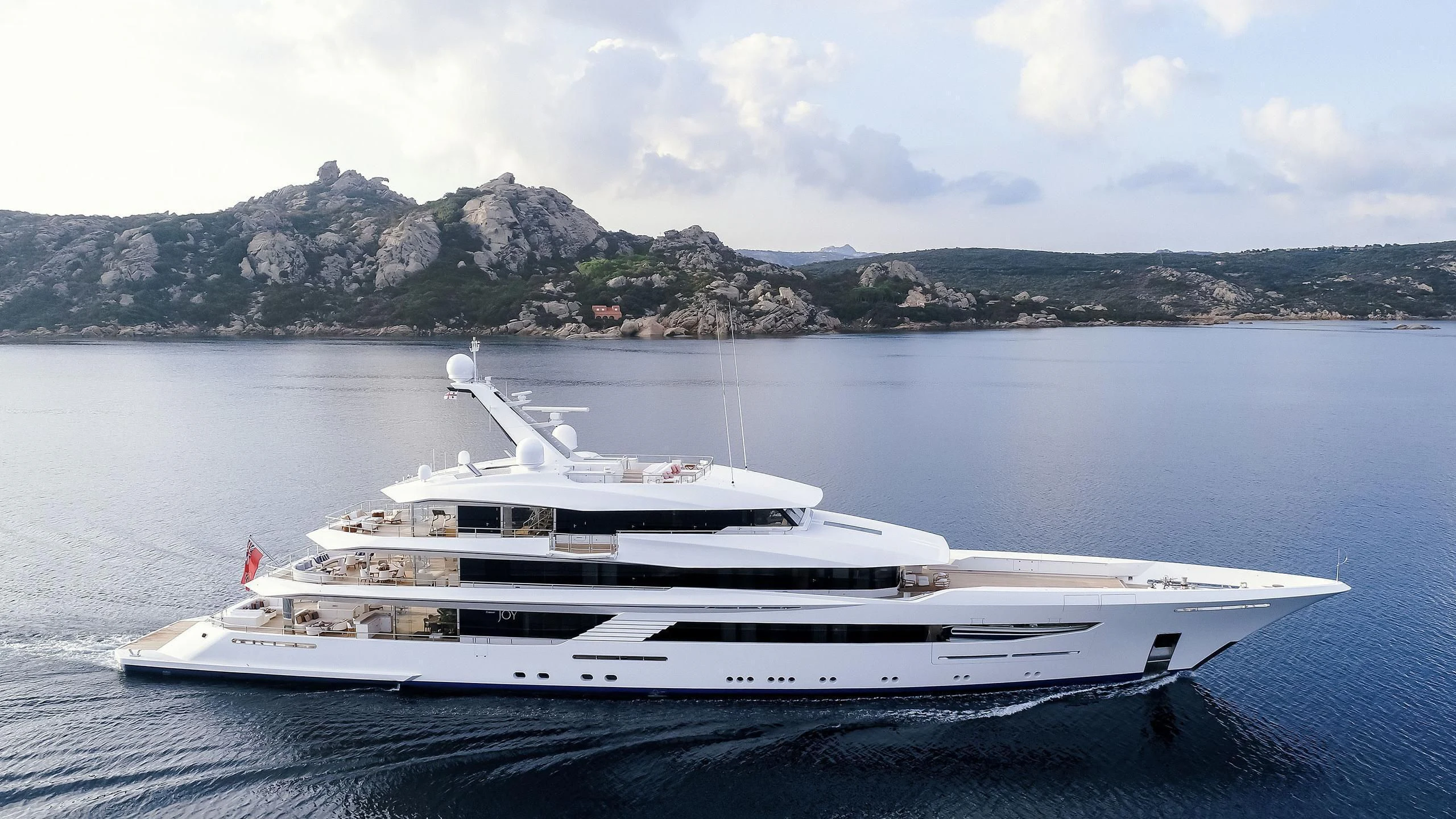 a white yacht in the water aboard JOY Yacht for Sale