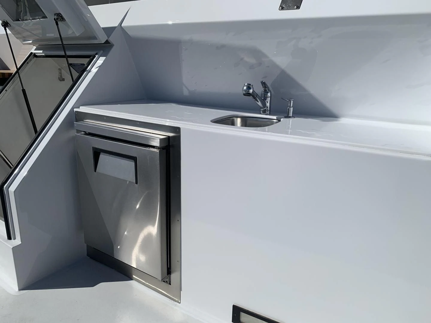 a kitchen with a sink and a faucet aboard WHISKEY DAWN Yacht for Sale