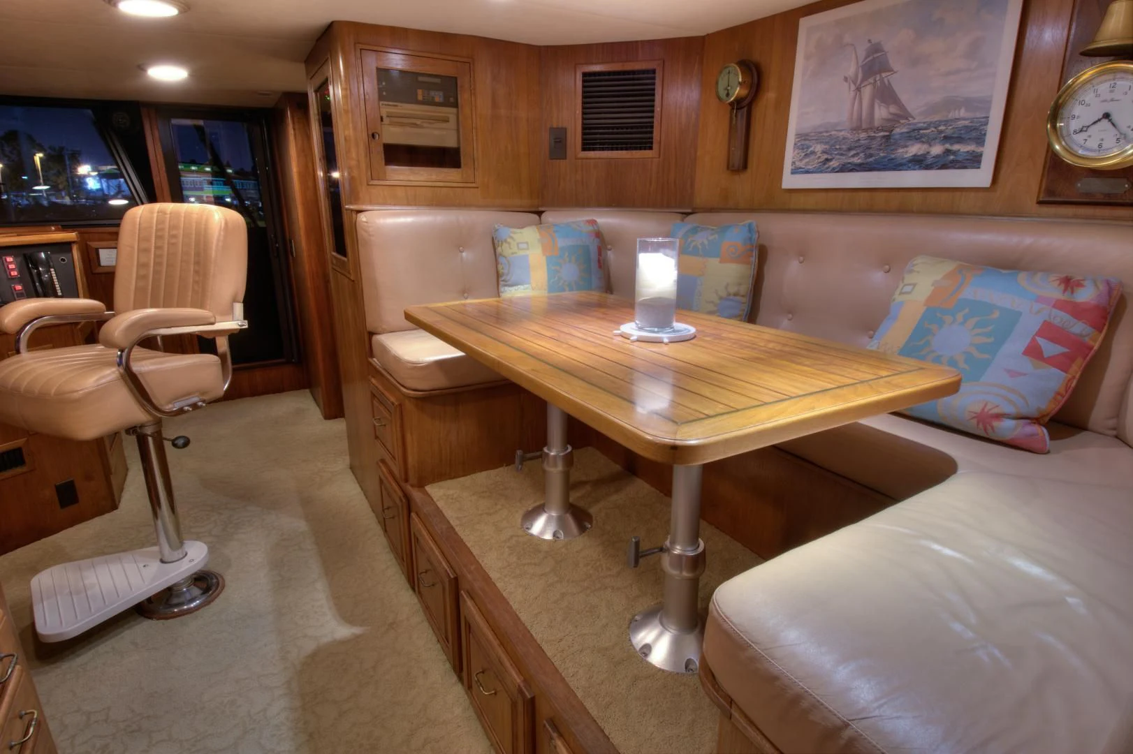 a room with a table and chairs aboard WHISKEY DAWN Yacht for Sale