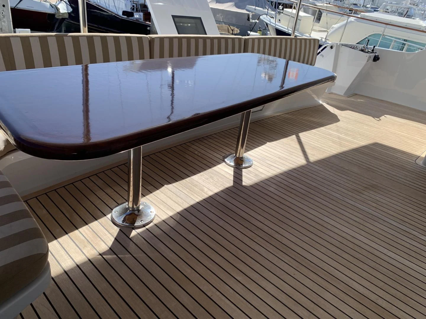 a table on a deck aboard WHISKEY DAWN Yacht for Sale