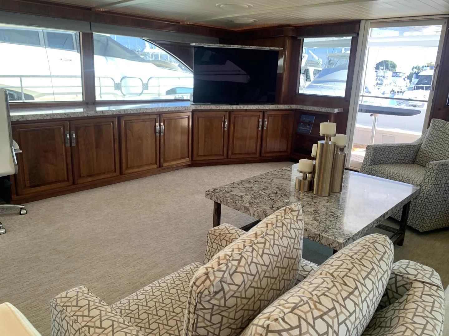 a living room with a couch and a table aboard WHISKEY DAWN Yacht for Sale