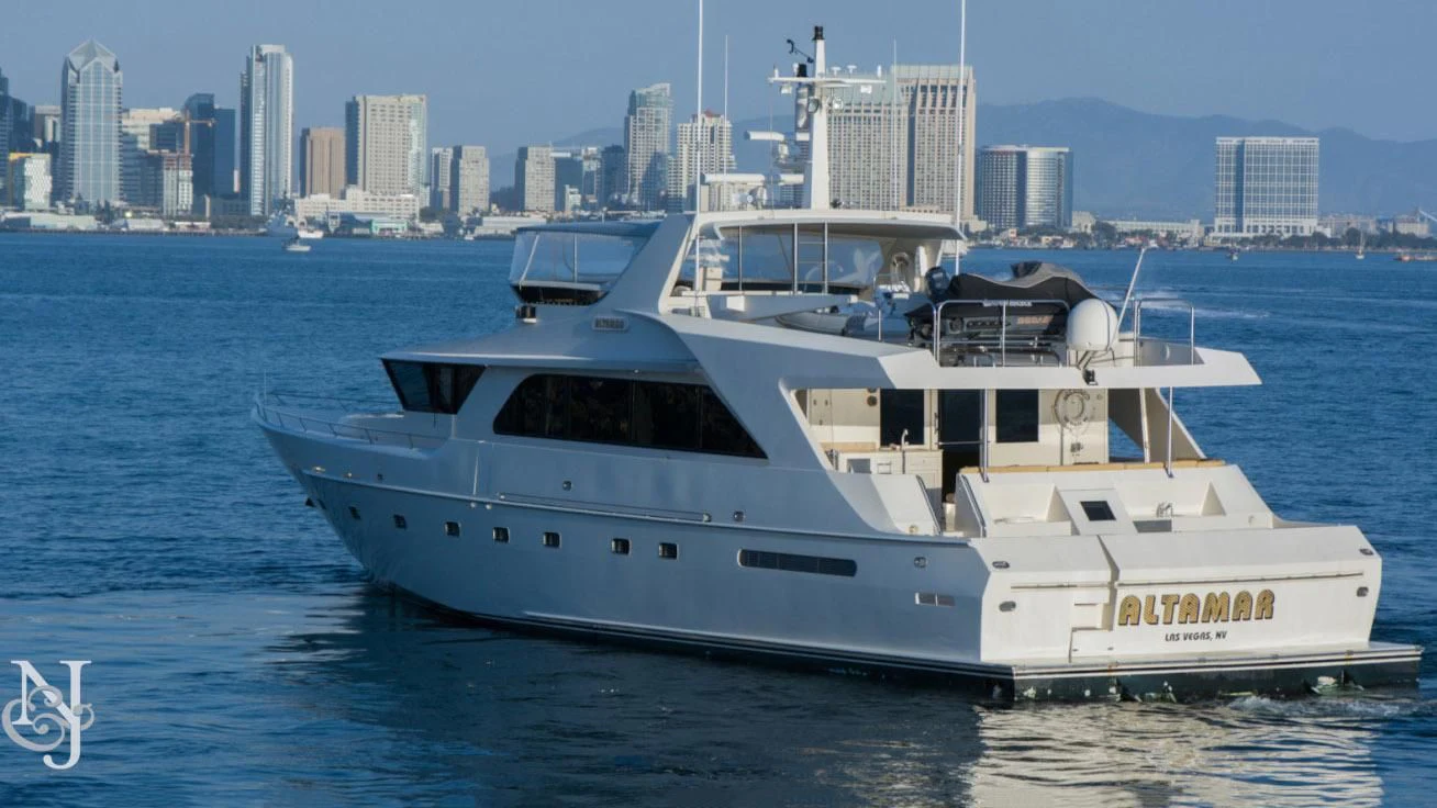 a white yacht in the water aboard WHISKEY DAWN Yacht for Sale
