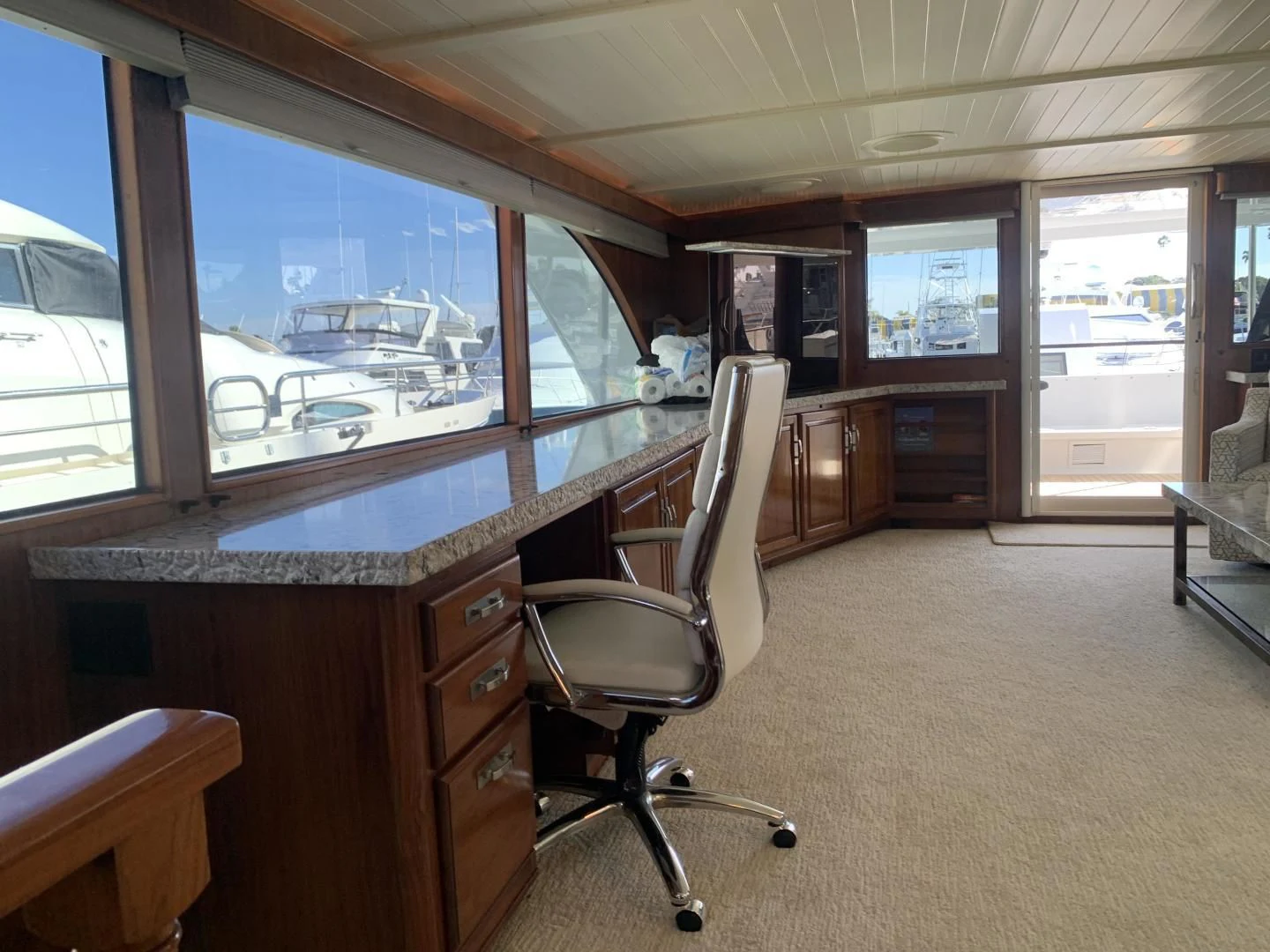 a room with a desk and a window aboard WHISKEY DAWN Yacht for Sale