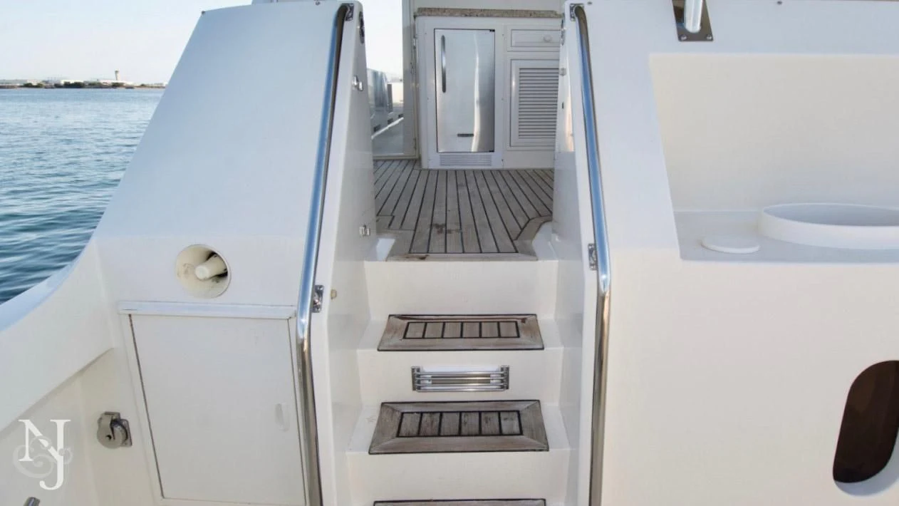 a white machine on the water aboard WHISKEY DAWN Yacht for Sale
