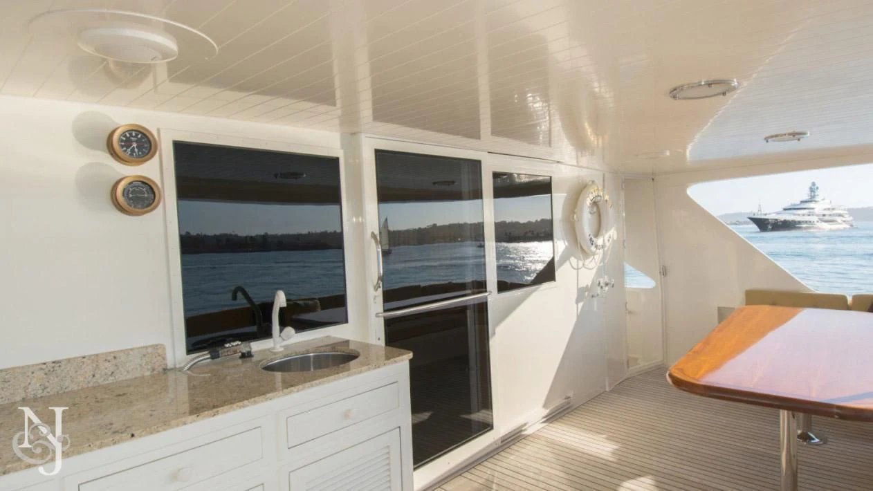 a kitchen with a view of the ocean aboard WHISKEY DAWN Yacht for Sale