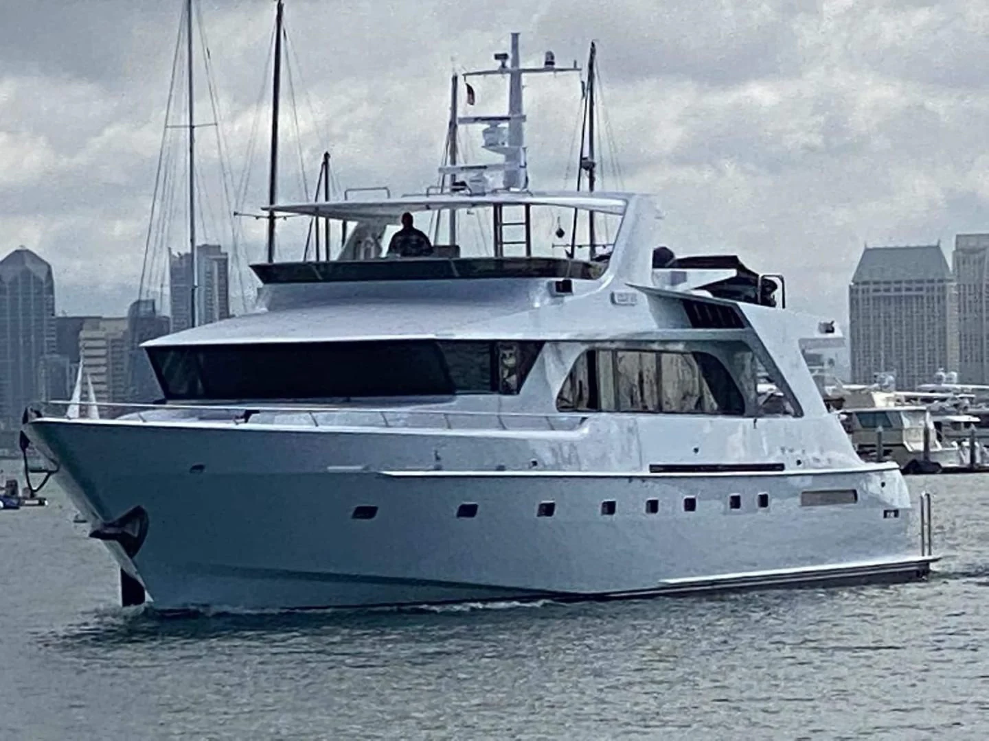 a large white boat in the water aboard WHISKEY DAWN Yacht for Sale
