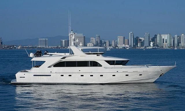 a white yacht in the water aboard WHISKEY DAWN Yacht for Sale