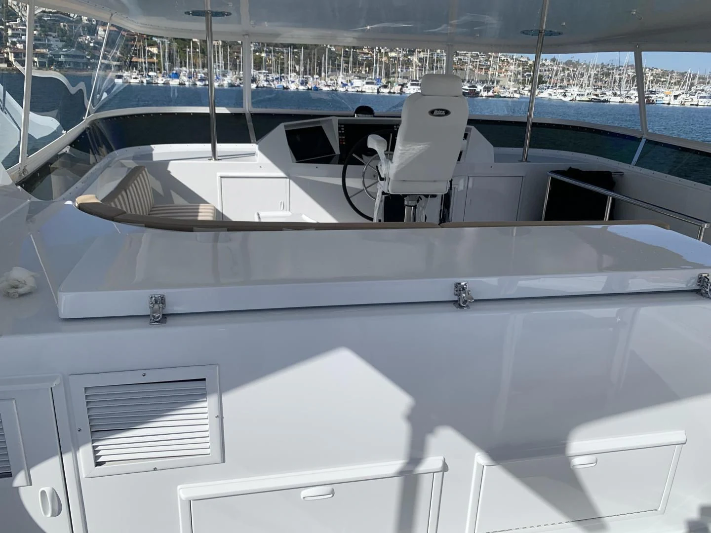 a white boat in a large body of water aboard WHISKEY DAWN Yacht for Sale