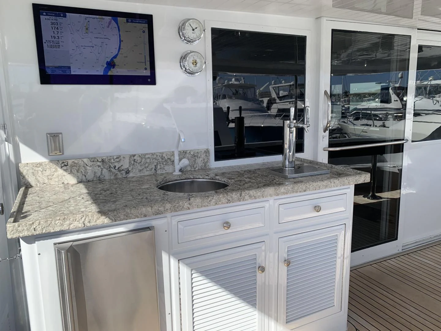 a kitchen with a sink and a countertop aboard WHISKEY DAWN Yacht for Sale