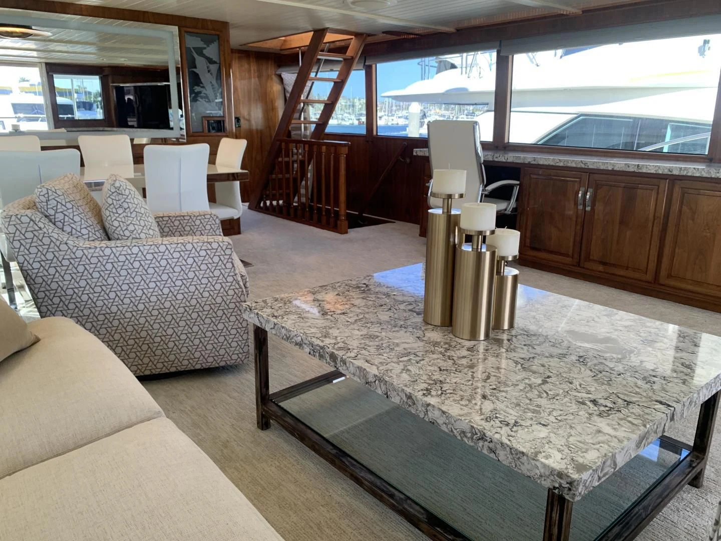 a living room with a large glass window aboard WHISKEY DAWN Yacht for Sale