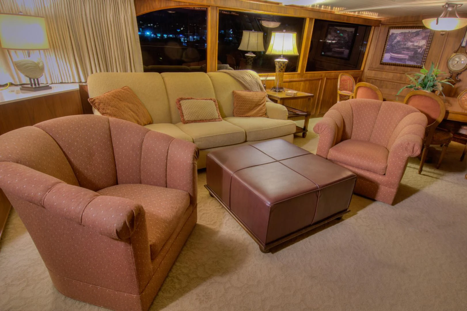 a living room with a couch and a table aboard WHISKEY DAWN Yacht for Sale