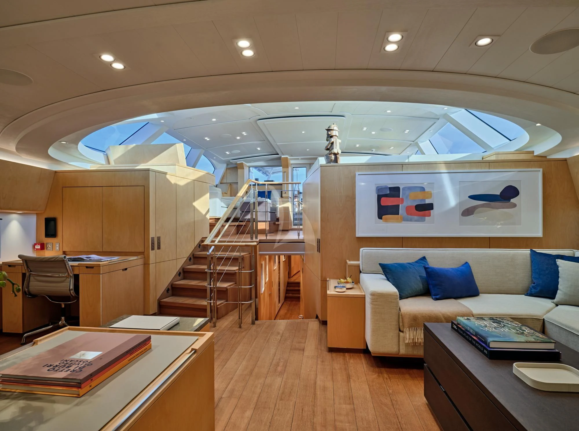 a living room with a large glass ceiling aboard GUILLEMOT Yacht for Sale