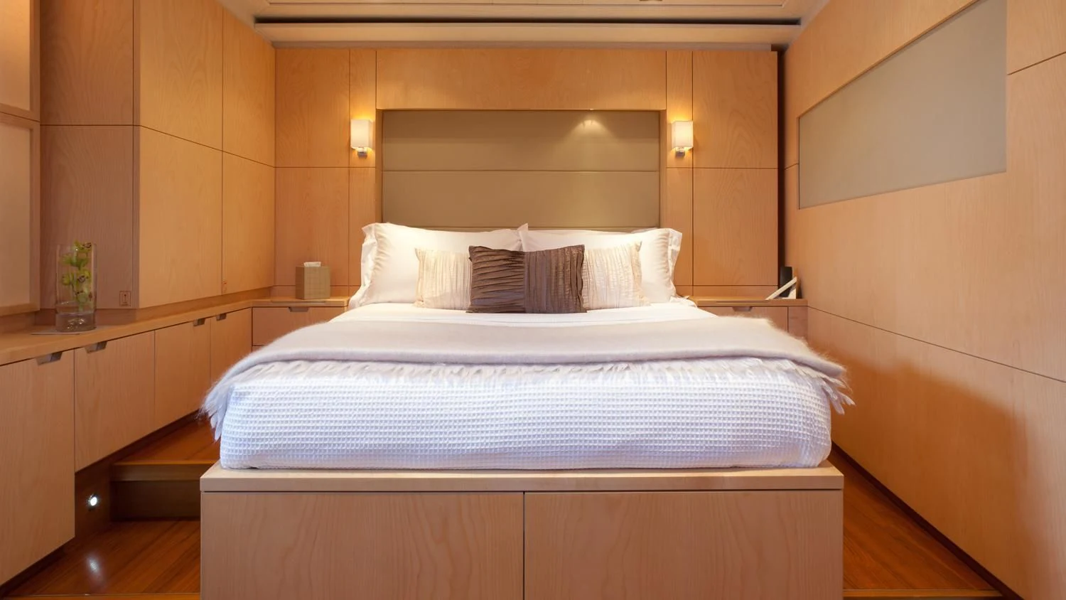 a bed with white sheets aboard GUILLEMOT Yacht for Sale