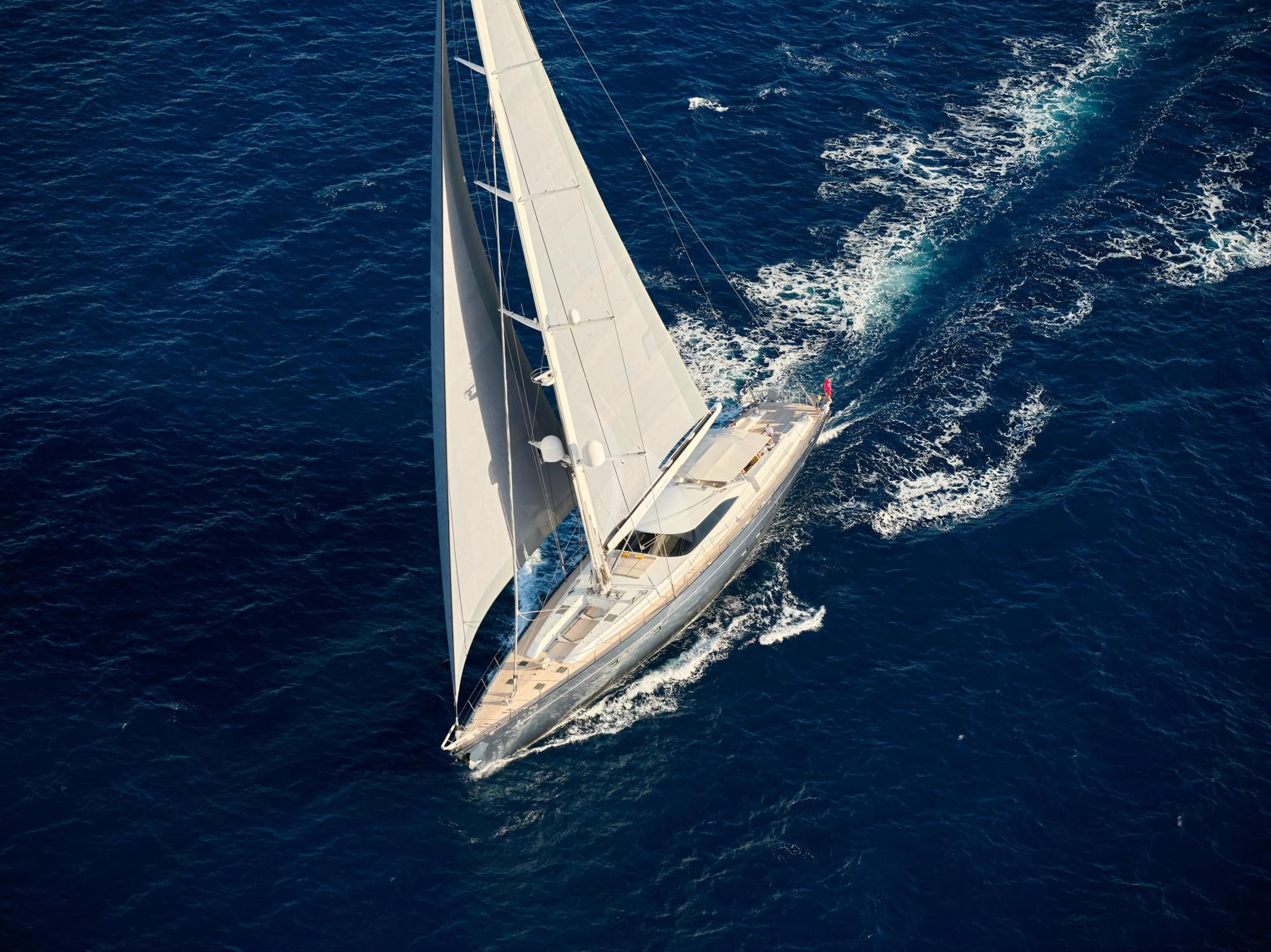 a white boat on the water aboard GUILLEMOT Yacht for Sale