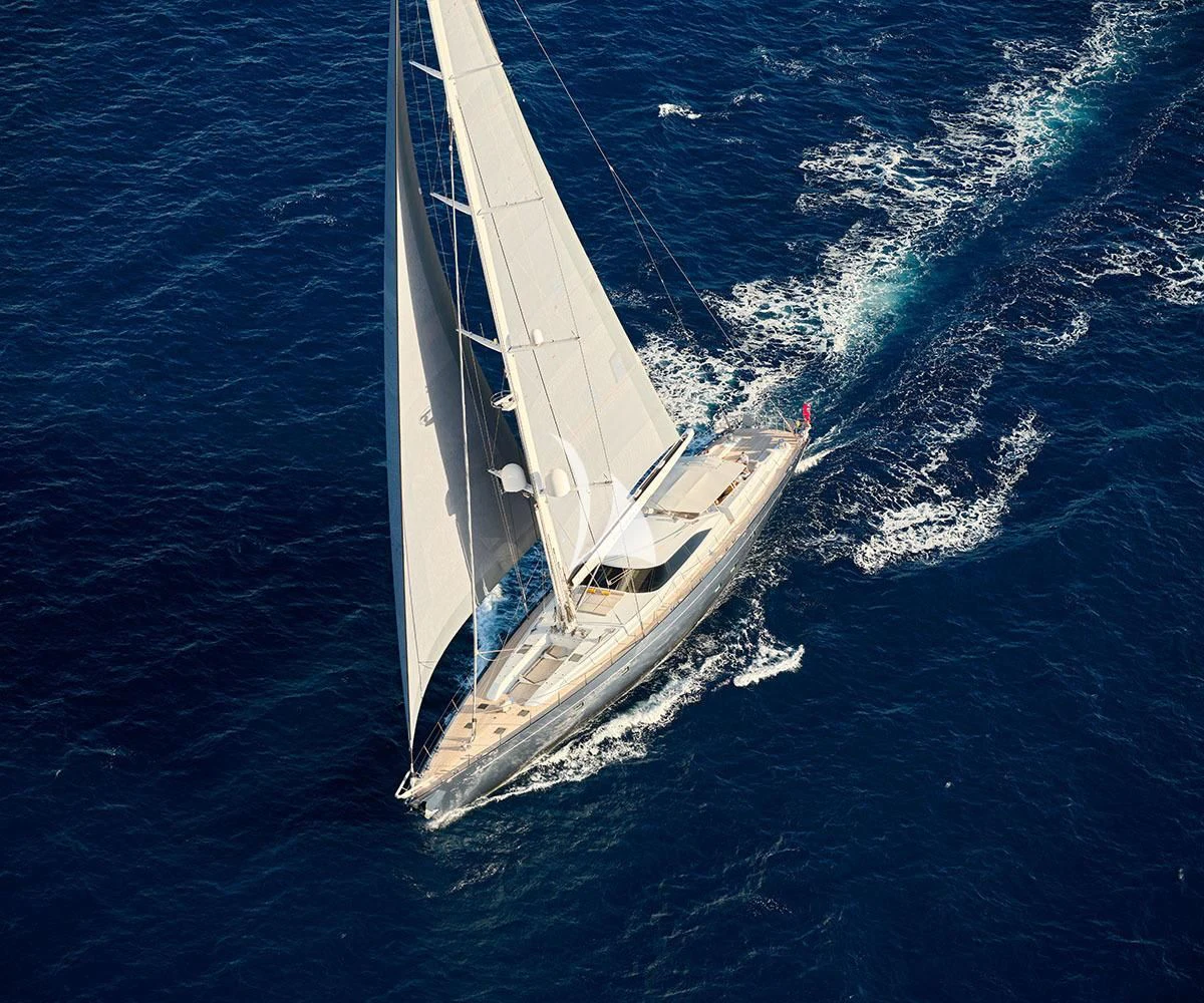 a white sailboat on the water aboard GUILLEMOT Yacht for Sale
