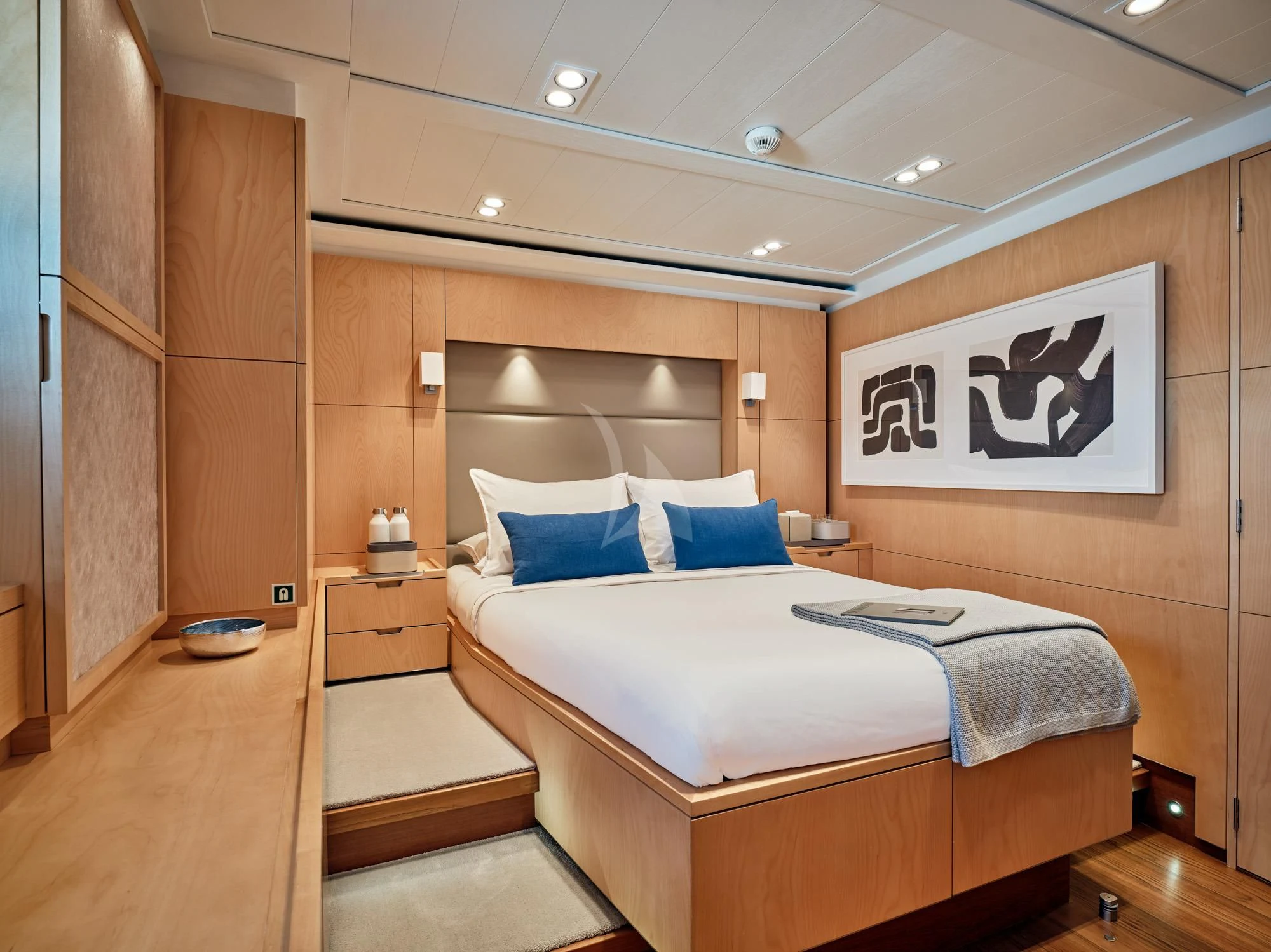 a room with a bed and a desk aboard GUILLEMOT Yacht for Sale