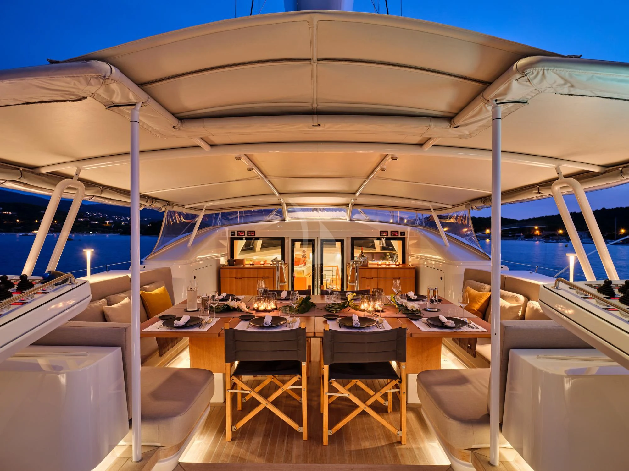 a restaurant with tables and chairs aboard GUILLEMOT Yacht for Sale