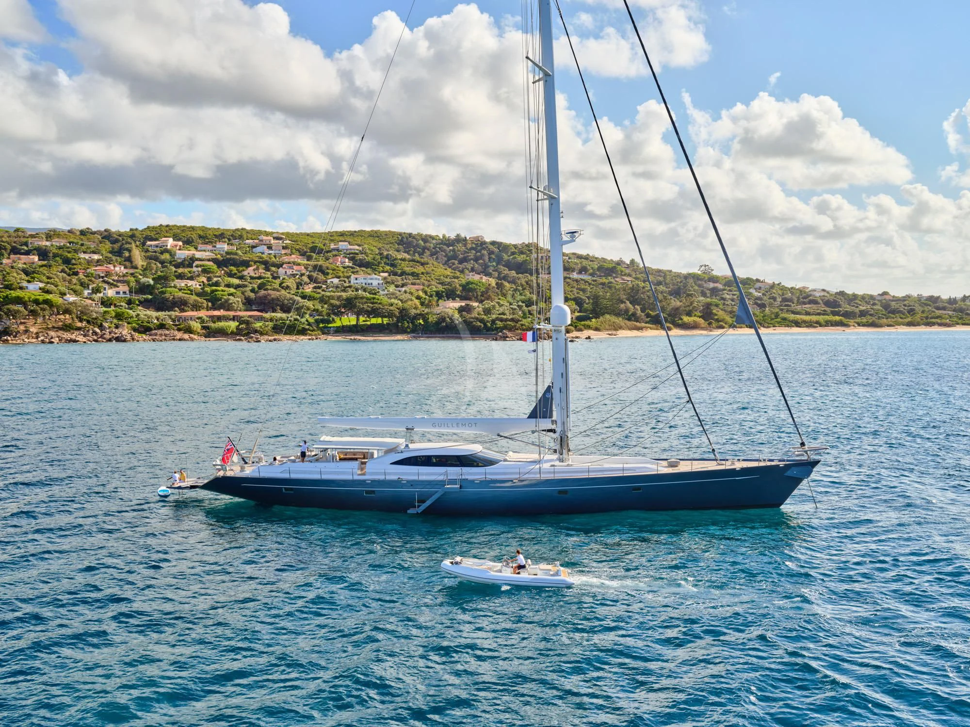a boat sailing on the water aboard GUILLEMOT Yacht for Sale