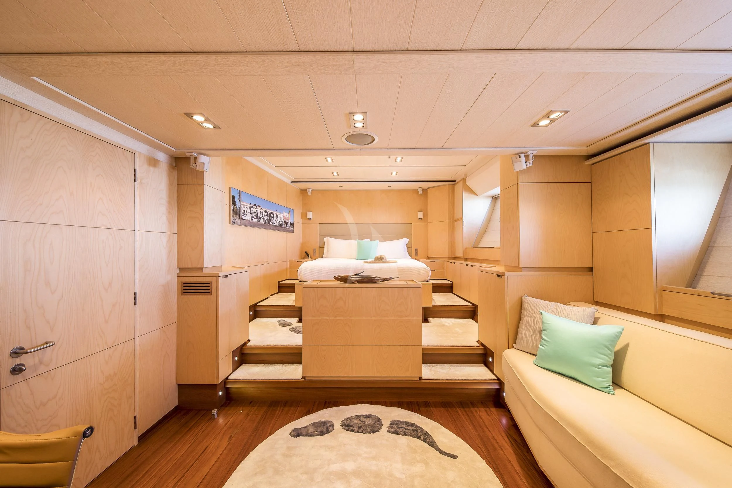 a room with a bed and a desk aboard GUILLEMOT Yacht for Sale