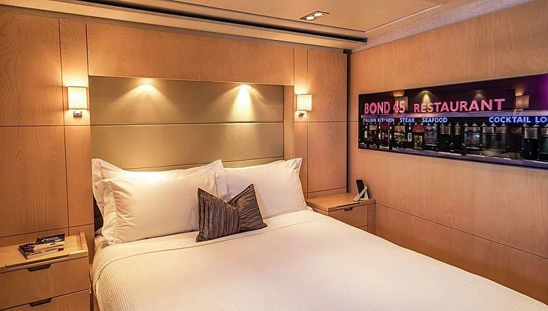 a bed with pillows aboard GUILLEMOT Yacht for Sale