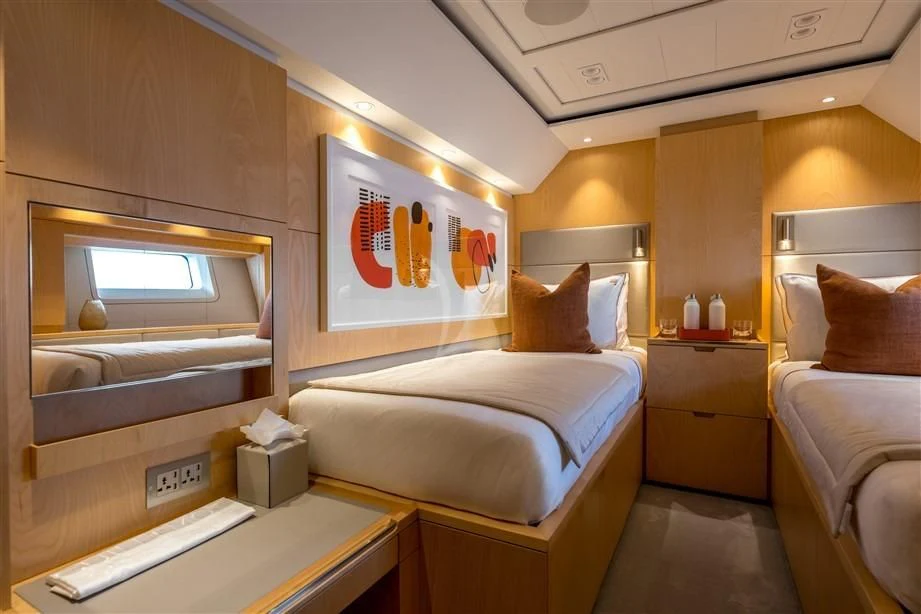 a room with two beds aboard GUILLEMOT Yacht for Sale