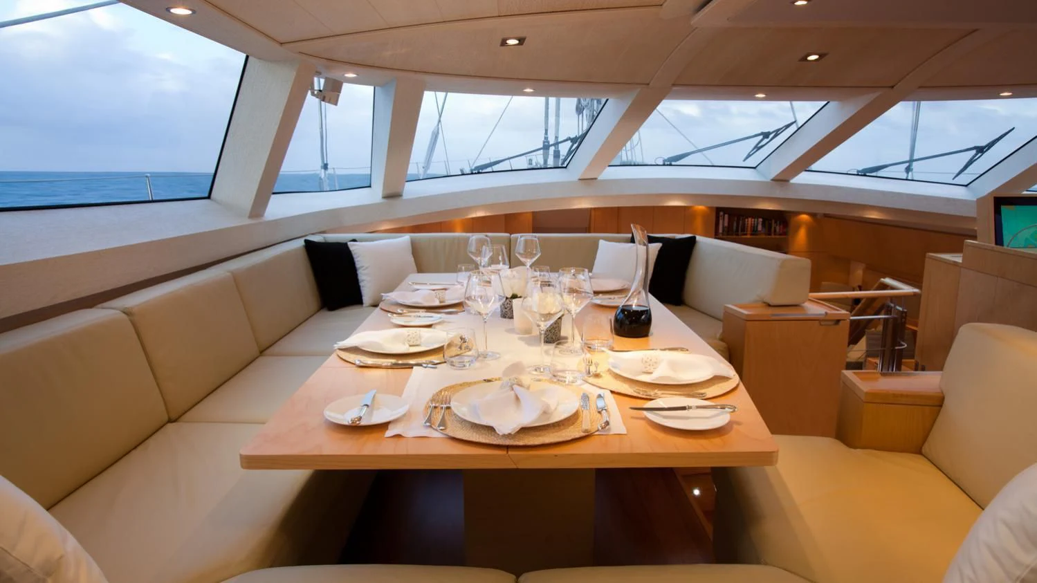 a table set for a dinner aboard GUILLEMOT Yacht for Sale