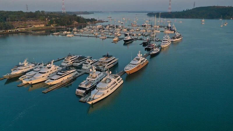 a group of boats in a harbor aboard GUILLEMOT Yacht for Sale