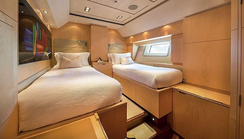 a room with two beds aboard GUILLEMOT Yacht for Sale