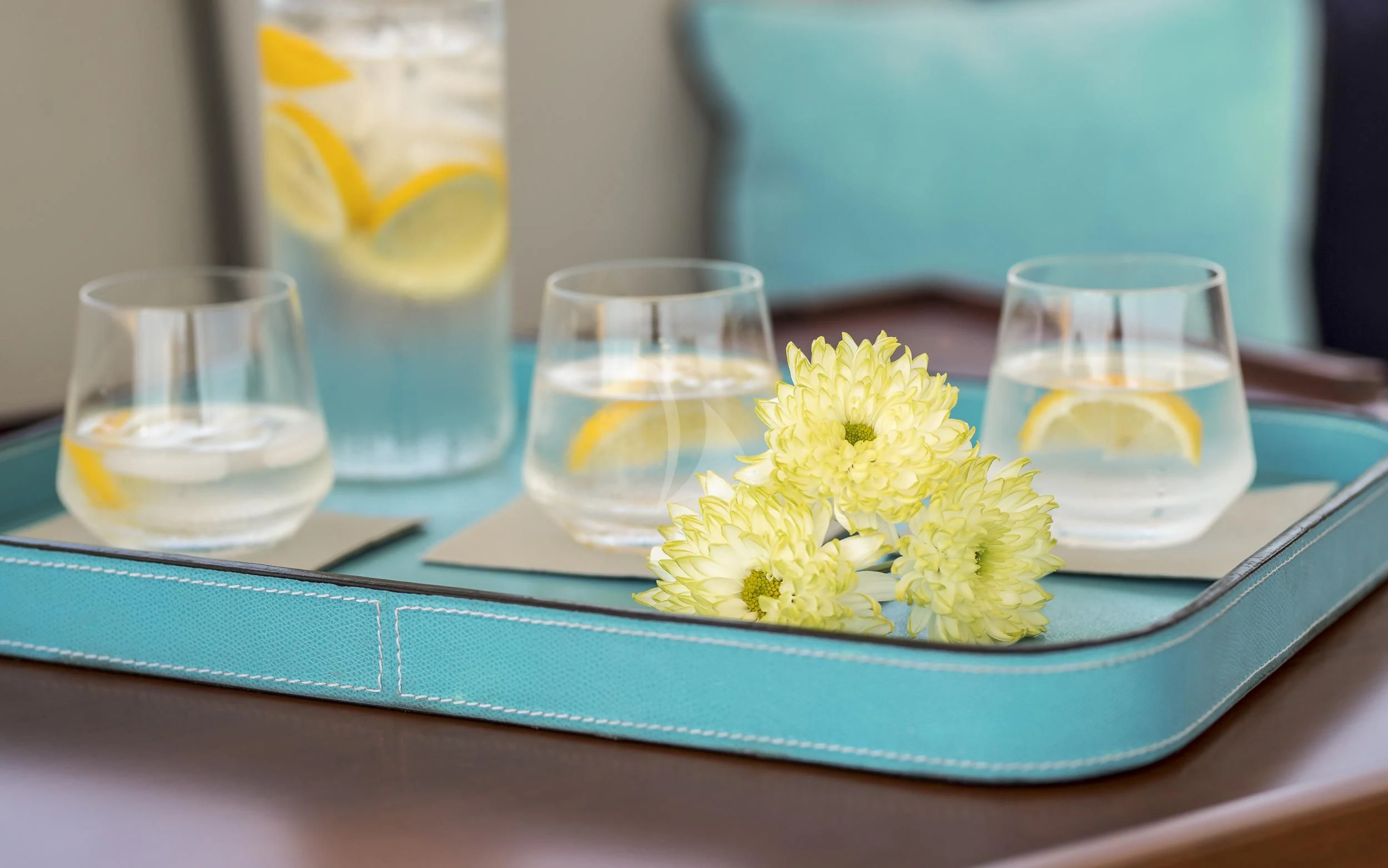 a plate of yellow flowers aboard GUILLEMOT Yacht for Sale