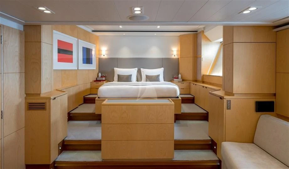 a room with a couch and a tv aboard GUILLEMOT Yacht for Sale
